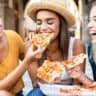 Woman eating Pizza