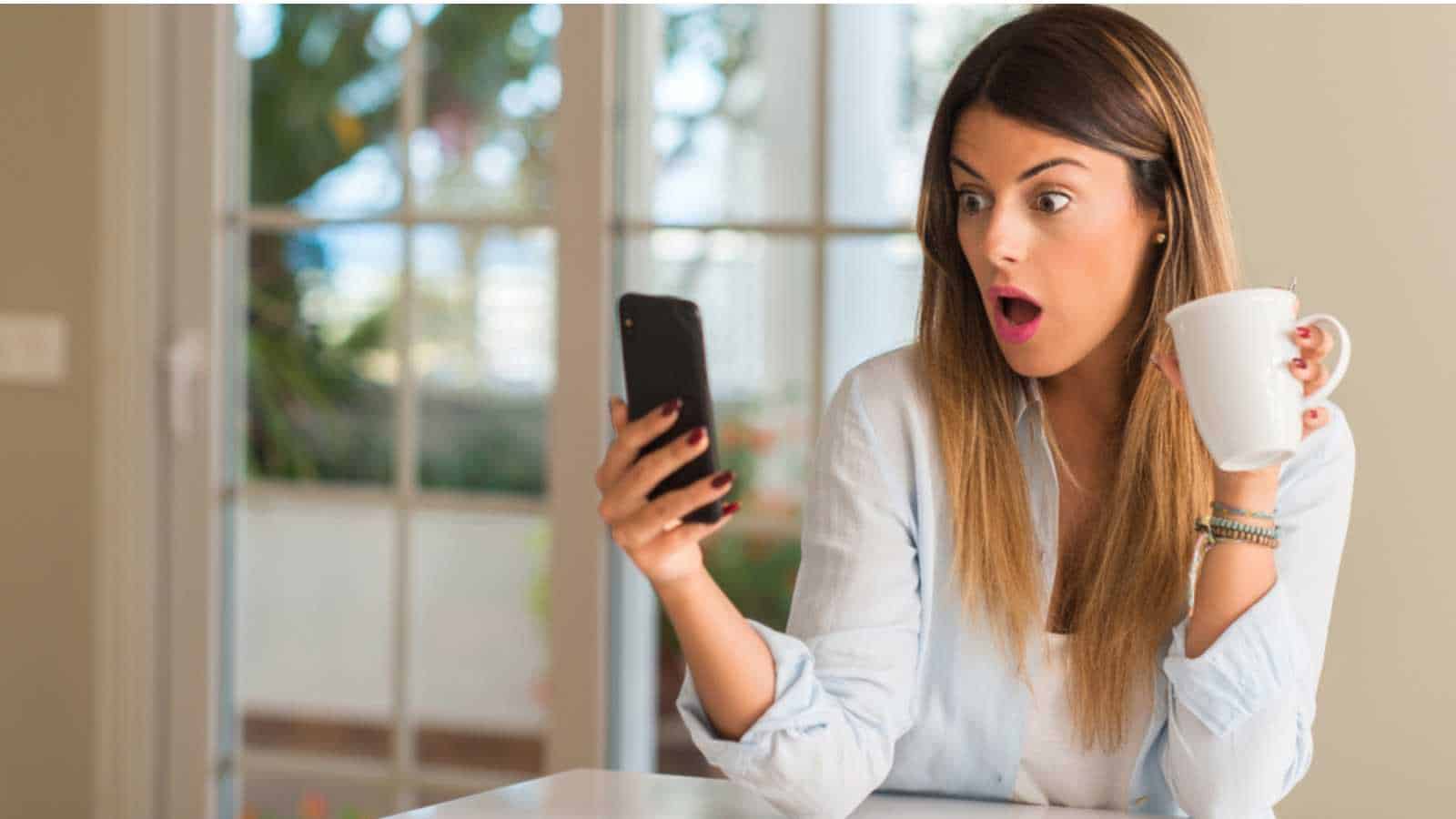 Woman on mobile excited