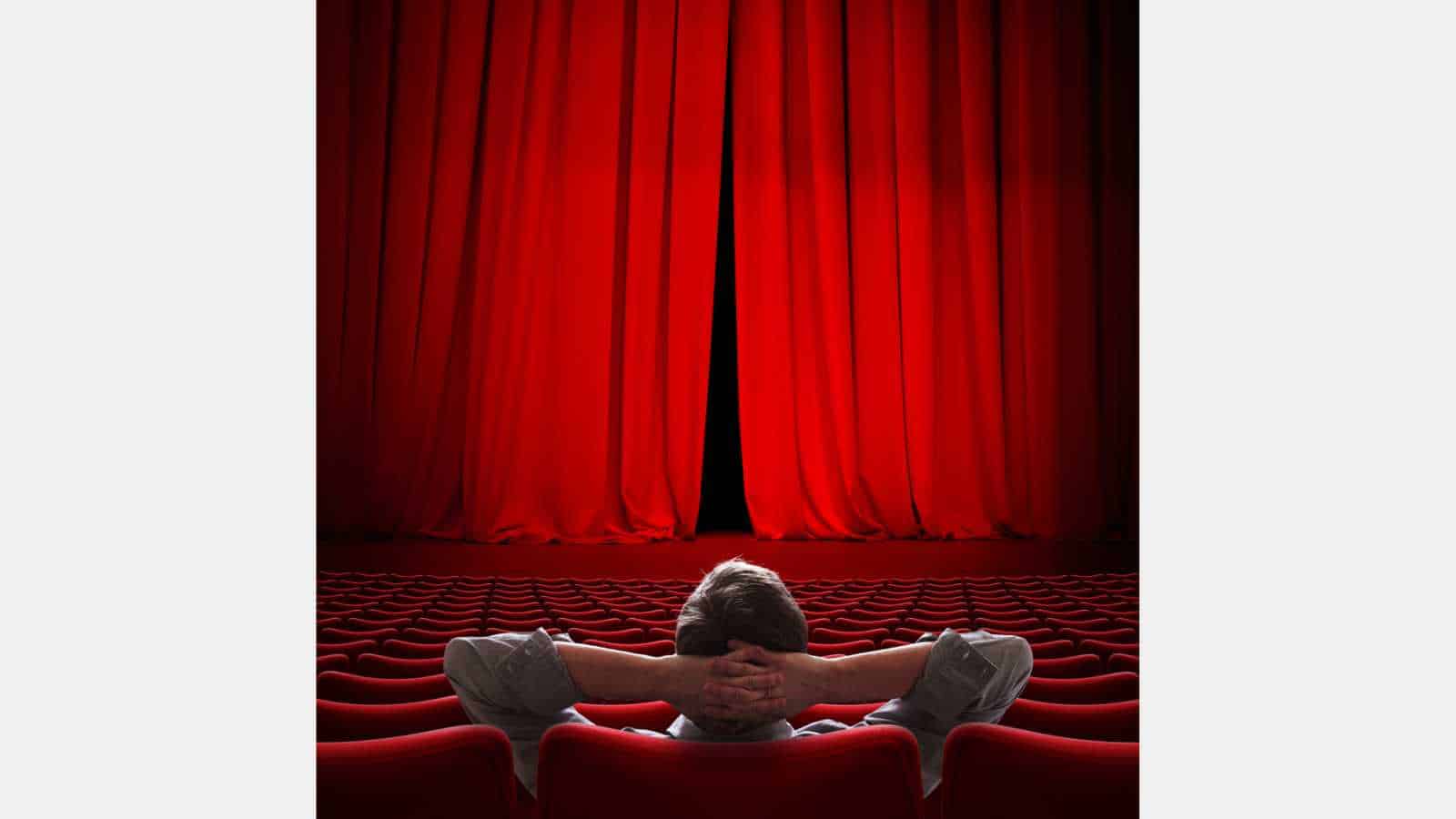 VIP sitting in movie theater red curtain 3d illustration