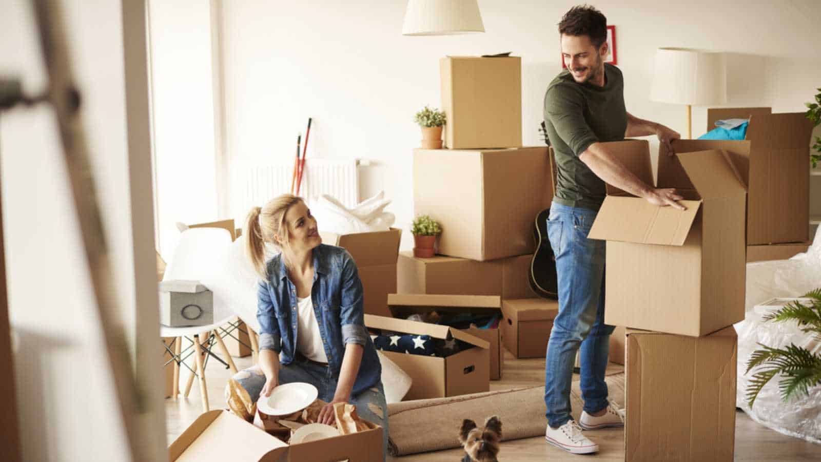 Couples unpacking in new house