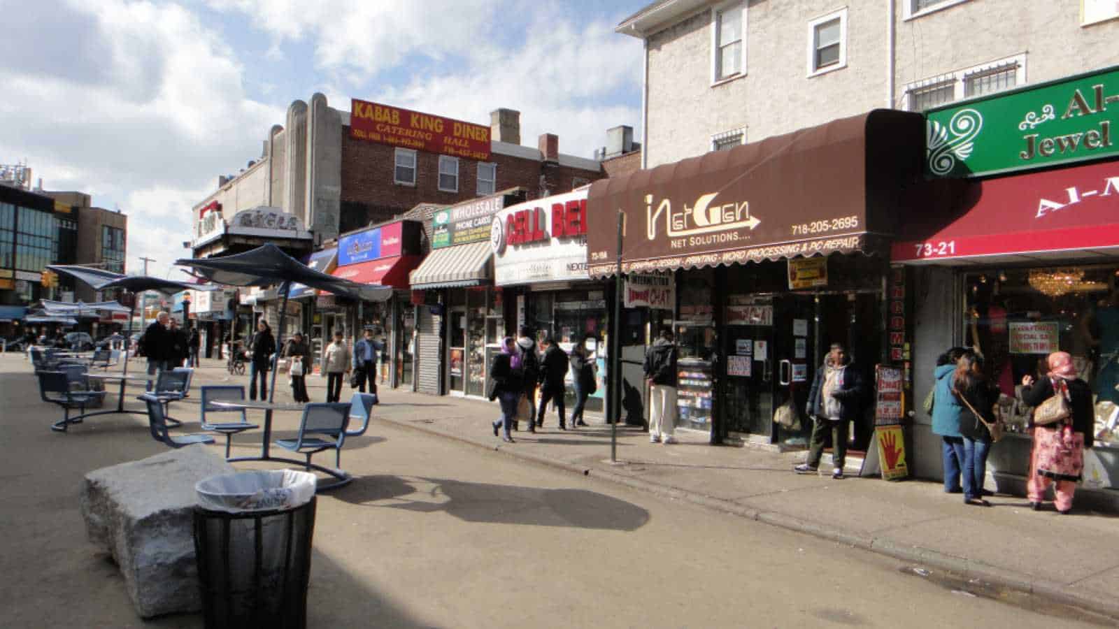 Queens, NY - March 10 2012: Diversity Plaza, a pedestrian plaza adjacent to South Asian businesses and restaurants in downtown Jackson Heights