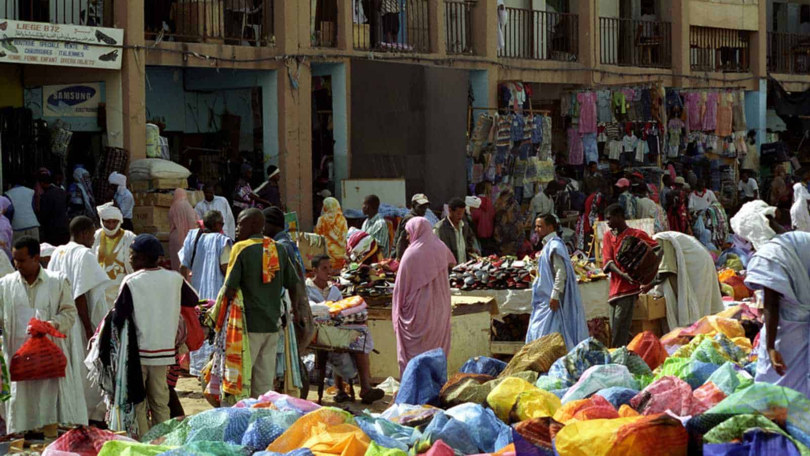 NOUAKCHOTT, MAURITANIA - JAN 5: Local people sell their staff at the market on January 5, 2006 in Nouakchott, Mauritania. The city market is an interesting place to visit.