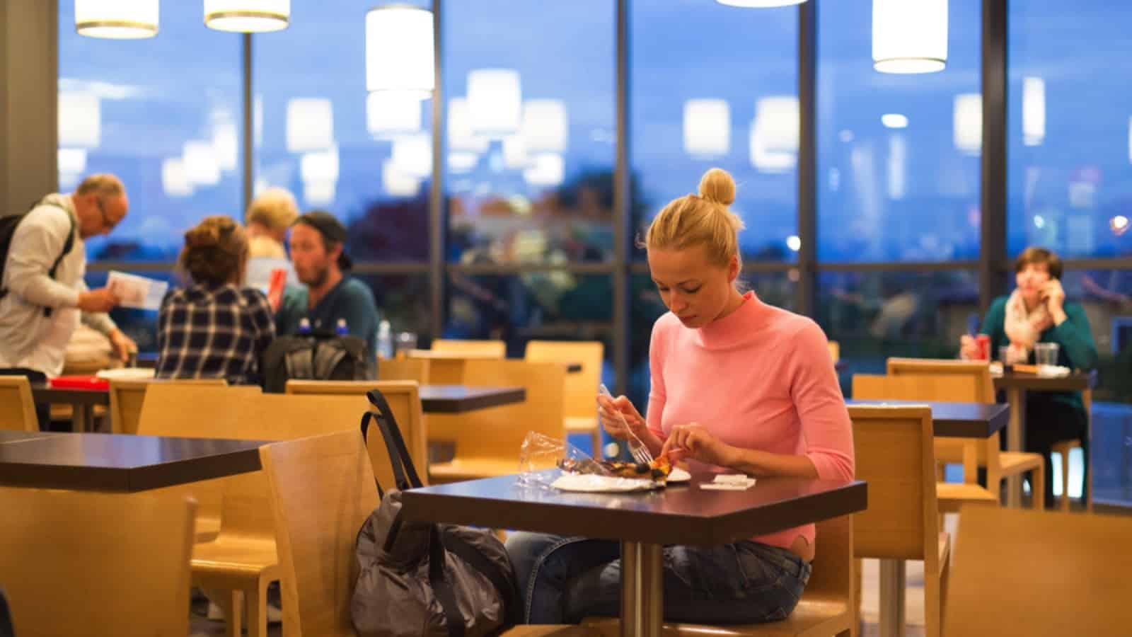Traveler eating airport