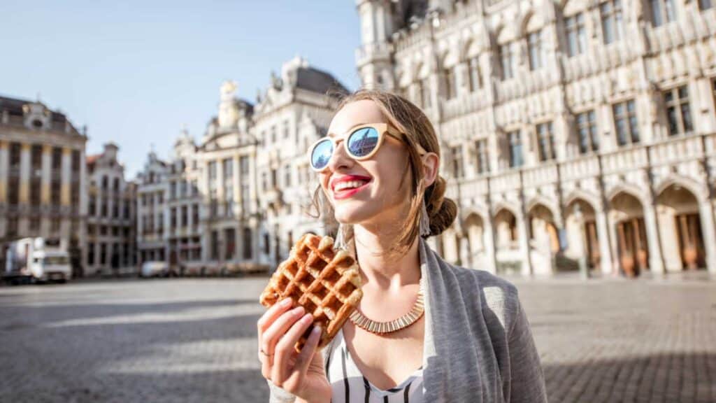 Woman eating waffles