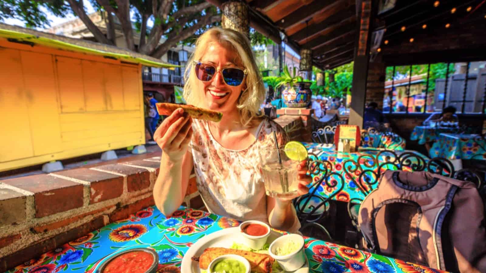 Woman traveler excited to eat food
