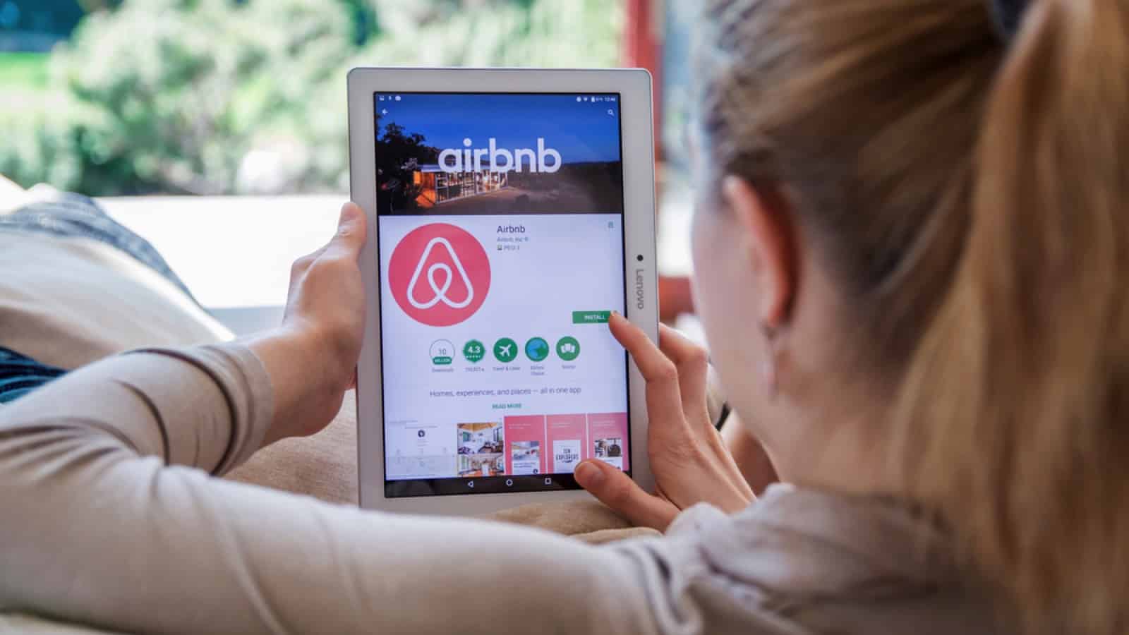Woman booking airbnb