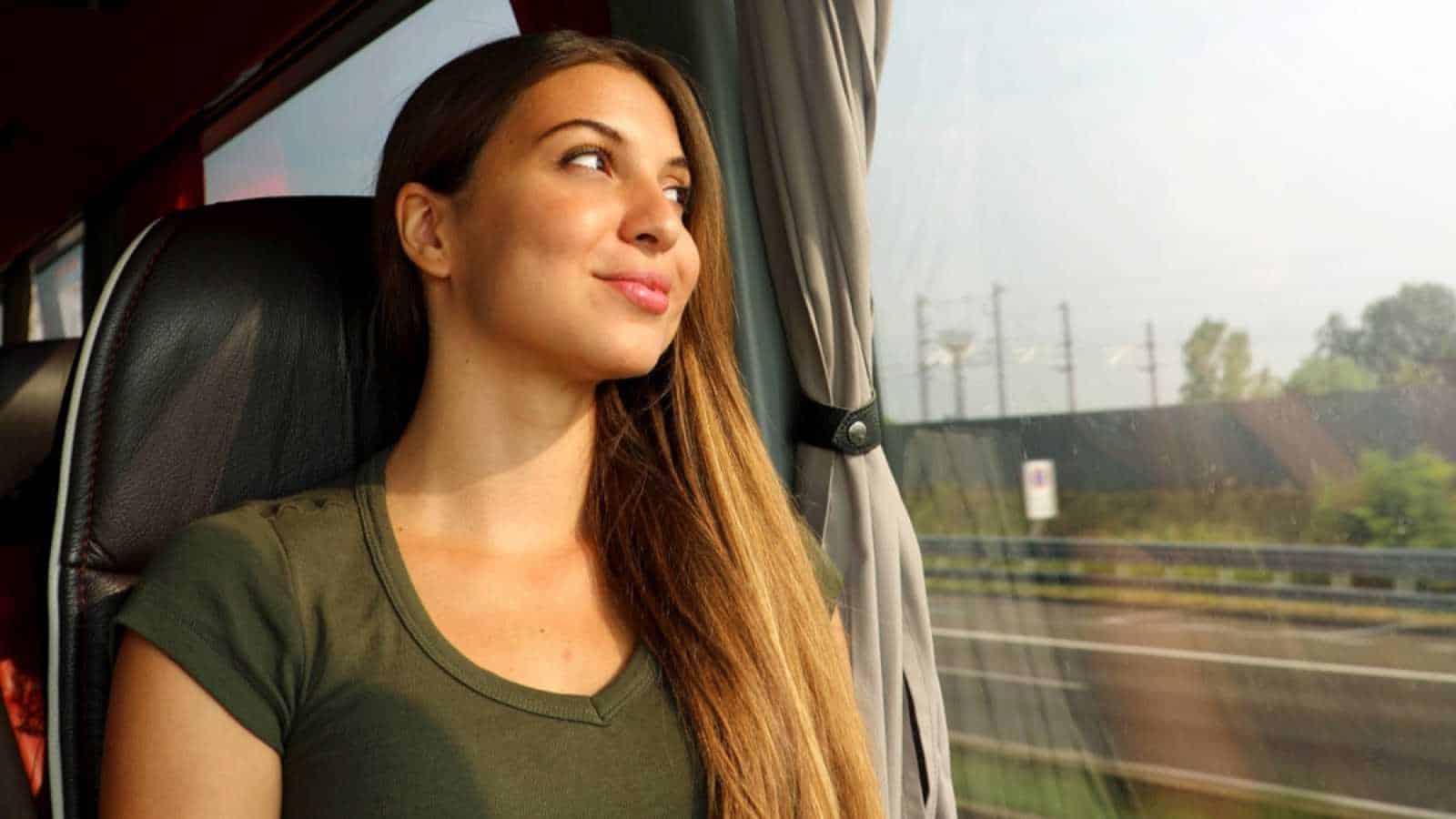 Woman tourist traveling in train