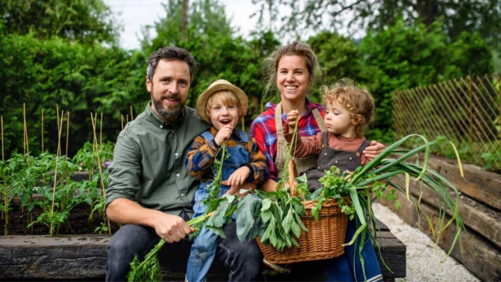 Family with vegetables from garden