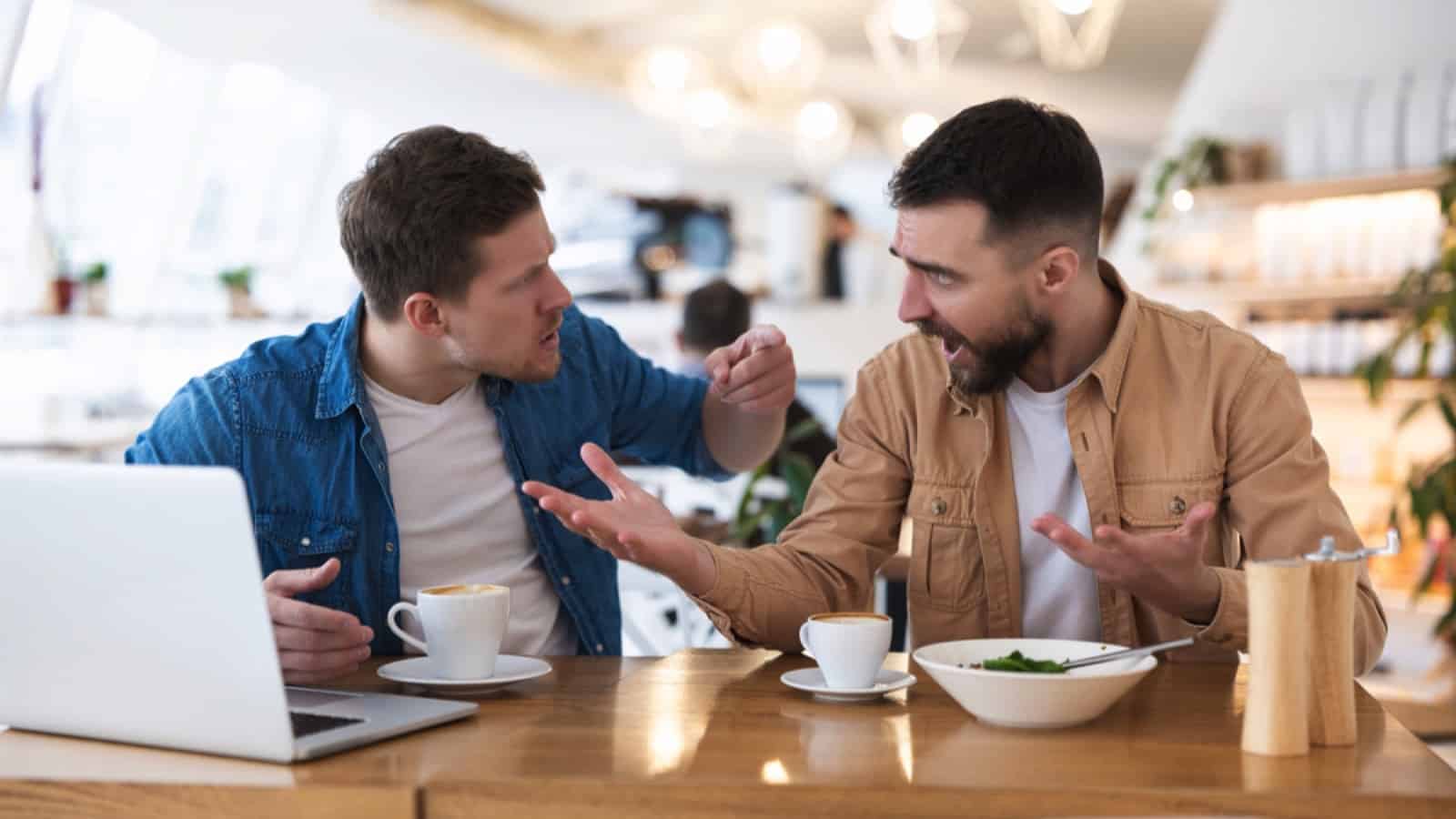 Men arguing about work